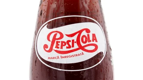 Bottle of Pepsi Cola Classic and water drops Video stock 146100201