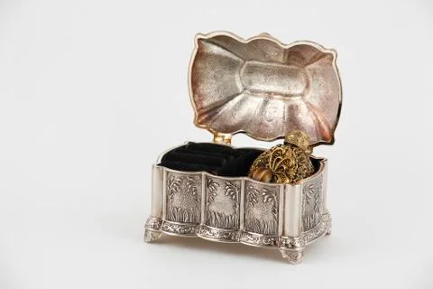 Bottle of perfume in the casket Stock Photos