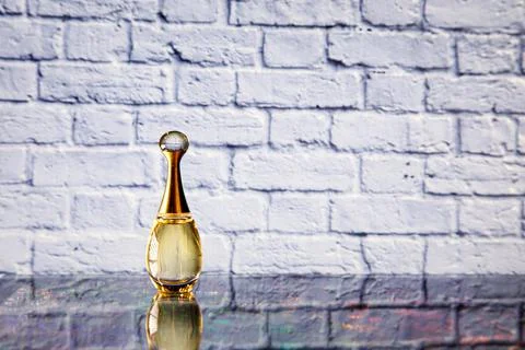 Bottle of perfume on the table Stock Photos