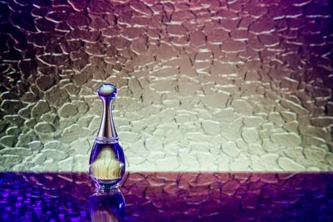 Bottle of perfume on the table Stock Photos