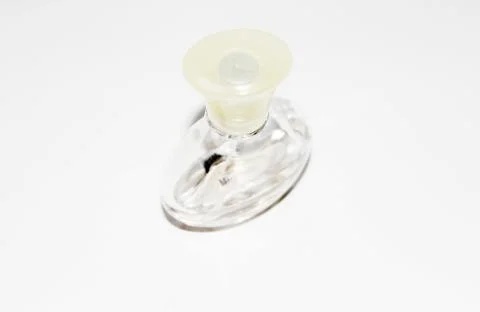 Bottle with perfume on a white background Stock Photos