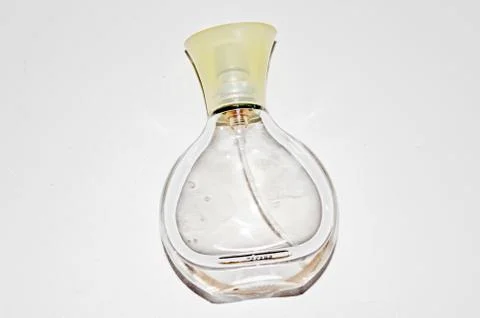 Bottle with perfume on a white background Stock Photos
