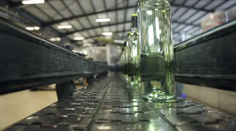 Bottle point of view in conveyor belt Stock Footage 63153408
