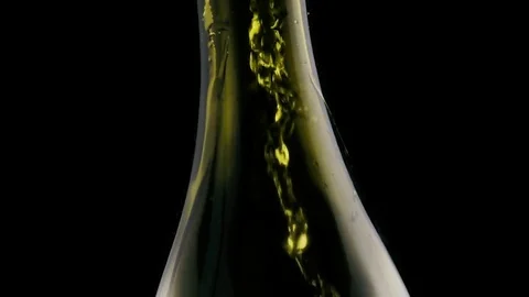 In a bottle to pour wine camera at an angle. Slow motion Stock Footage 75956115