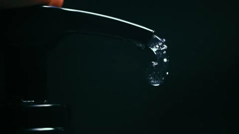Bottle Presses and Clear Liquid Oozes Out Stock Footage 300892474