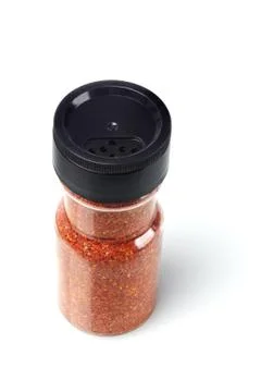 Bottle of red chilli powder Stock Photos