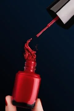 Bottle of red nail polish Stock Photos