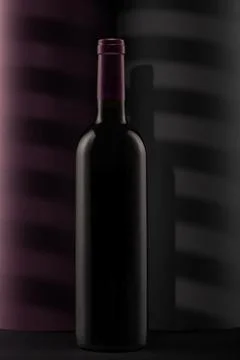 Bottle of red wine on a black background Stock Photos