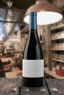 Bottle of red wine with a restaurant background Foto stock