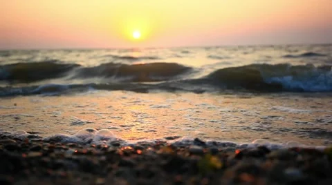 Bottle rolls along the shore during sunset. HD. 1920x1080 Stock Footage 44362156