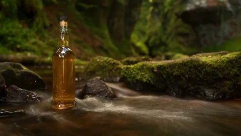 Bottle of scottish whisky Stockbeeldmateriaal 69961844