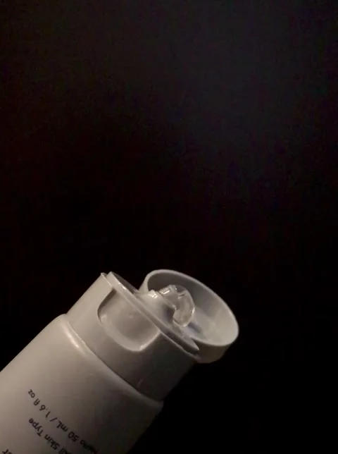 Bottle of serum and gel Flat lay. Liquid gel or serum drop with pipette on black Stock Footage 246981251