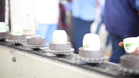 Bottle shrink sleeve machine Stock Footage 77159979