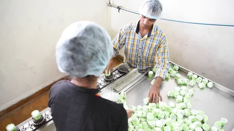 Bottle shrink sleeve machine Stock Footage 77160030