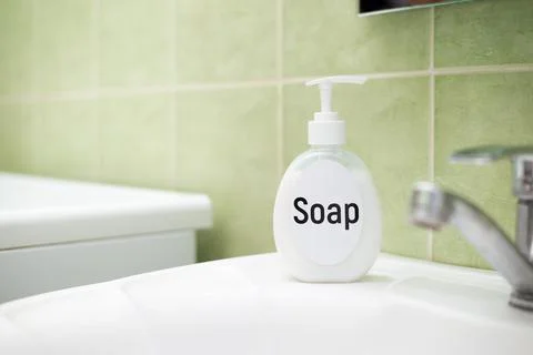 Bottle with soap Stock Photos