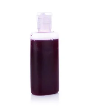 Bottle of soap on white background Фото