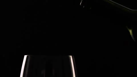 Bottle splash serving wine in glass Slow Motion Stock Footage 136065198