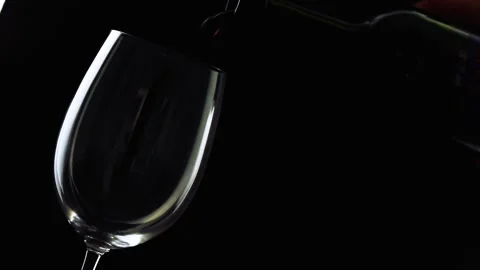 Bottle splash serving wine in glass Slow Motion Stock Footage 136065201