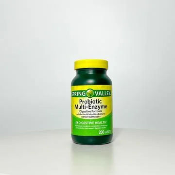 A bottle of Spring Valley Probiotic tablets on a white background. Stock Photos