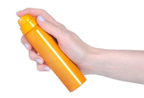 Bottle sunscreen spray in hand Stock Photos