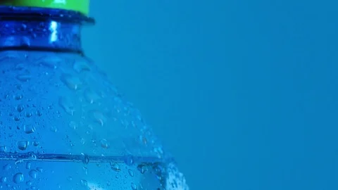 Bottle of table water covered with condensate, close shot. Camera slowly sliding Stock Footage 127474491