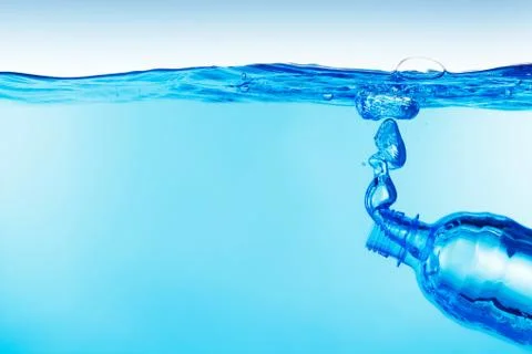 Bottle under water Stock Photos