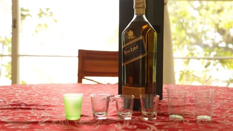 Bottle of whiskey Stock Footage 104776837