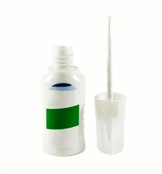 Bottle with white paint Stock Photos