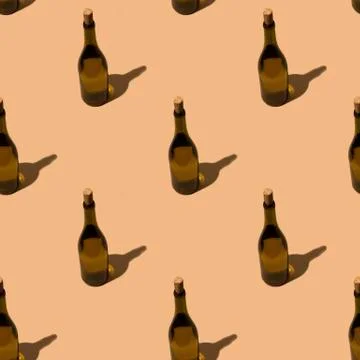A bottle of white wine seamless pattern. Stock Photos