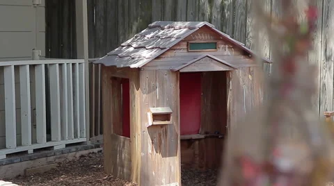 Bottle Wind-chimes in Front of Doghouse Video stock 52326849