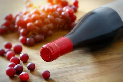 Bottle of wine and grape Stock Photos