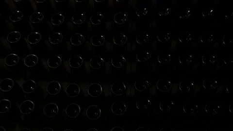 Bottle in wine cellar background Stock Photos
