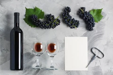 Bottle of wine glasses grape corkscrew empty card mockup Stock Photos