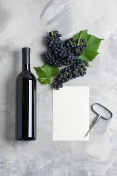 Bottle of wine grape leaves corkscrew empty card mockup Stock Photos