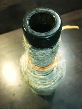 A bottle wrapped in string on up look Stock Photos