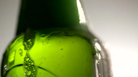 Bottled Beer and Falling Foam Bubbles 2 Stock-Footage 53037896