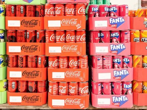 Bottled Refreshments Display Featuring Coca-Cola and Fanta Stock Photos