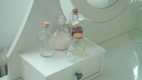 Bottled scents tracking shot Stock Footage 136405010