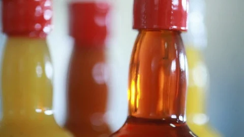 Bottled vegetable oils waiting at the refinery to be purified into Stock Footage 101714174