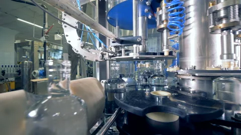 Bottles with alcohol on an assembly line. 스톡 동영상 90097530