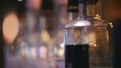 Bottles of alcoholic beverages, close up Stock Footage 71634493