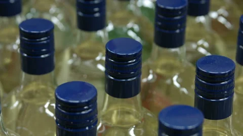 Bottles of alcoholic drink close-up Stock Footage 67980589