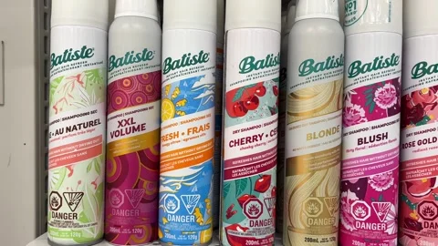 Bottles of Baptiste dry shampoo Stock Footage 293897894