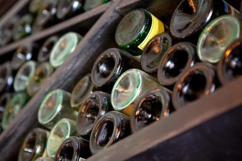 Bottles in the cellar Stock Photos
