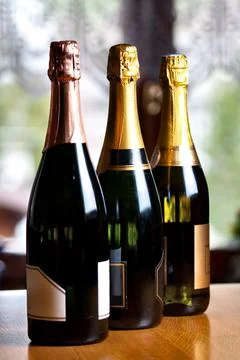 Bottles of champagne on a table. High quality photo. Stock Photos