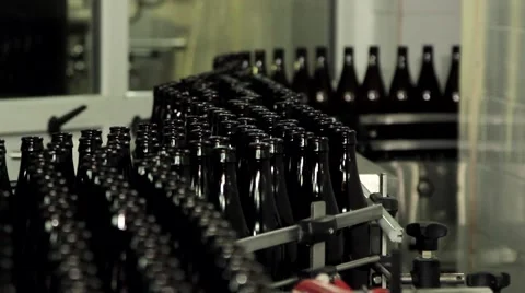 Bottles on the conveyor Stock Footage 60768799