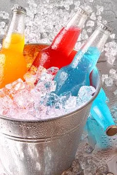 Bottles of cooler drinks with ice Stock-Fotos