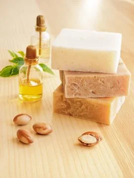 Bottles with cosmetic oil argan nuts. Cosmetic means. Food product. Jar with Stock Photos