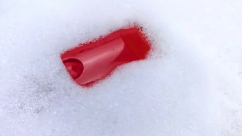 Bottles of detergents float in the foam. The concept of the dangers of household Stock-Footage 146720230