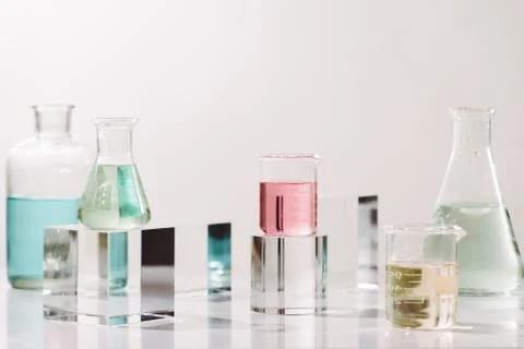 Bottles with different perfume oils on table Stock Photos
